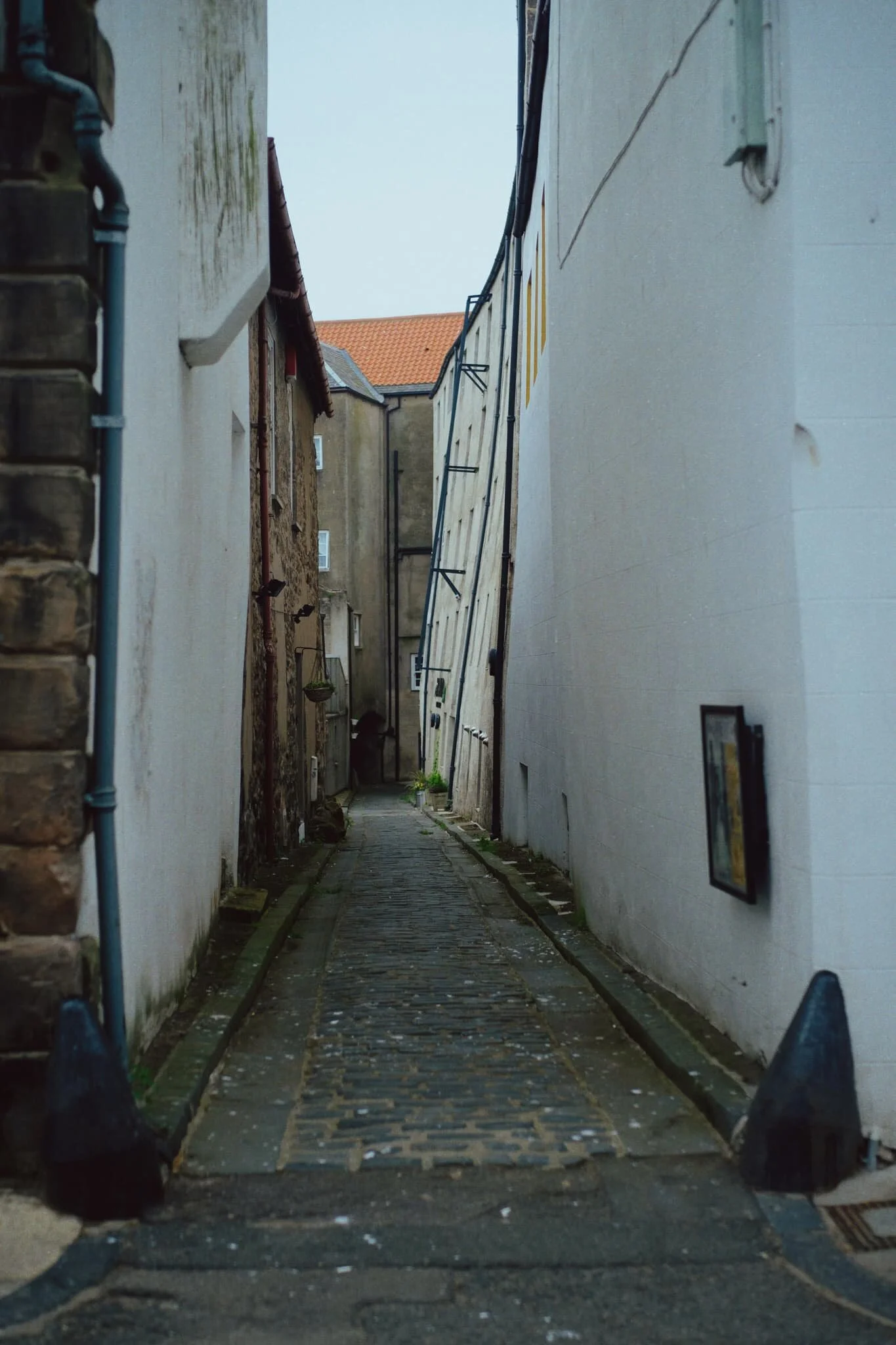 The weird leaning/curved building is the old Granary, now serving life as the Granary Gallery.