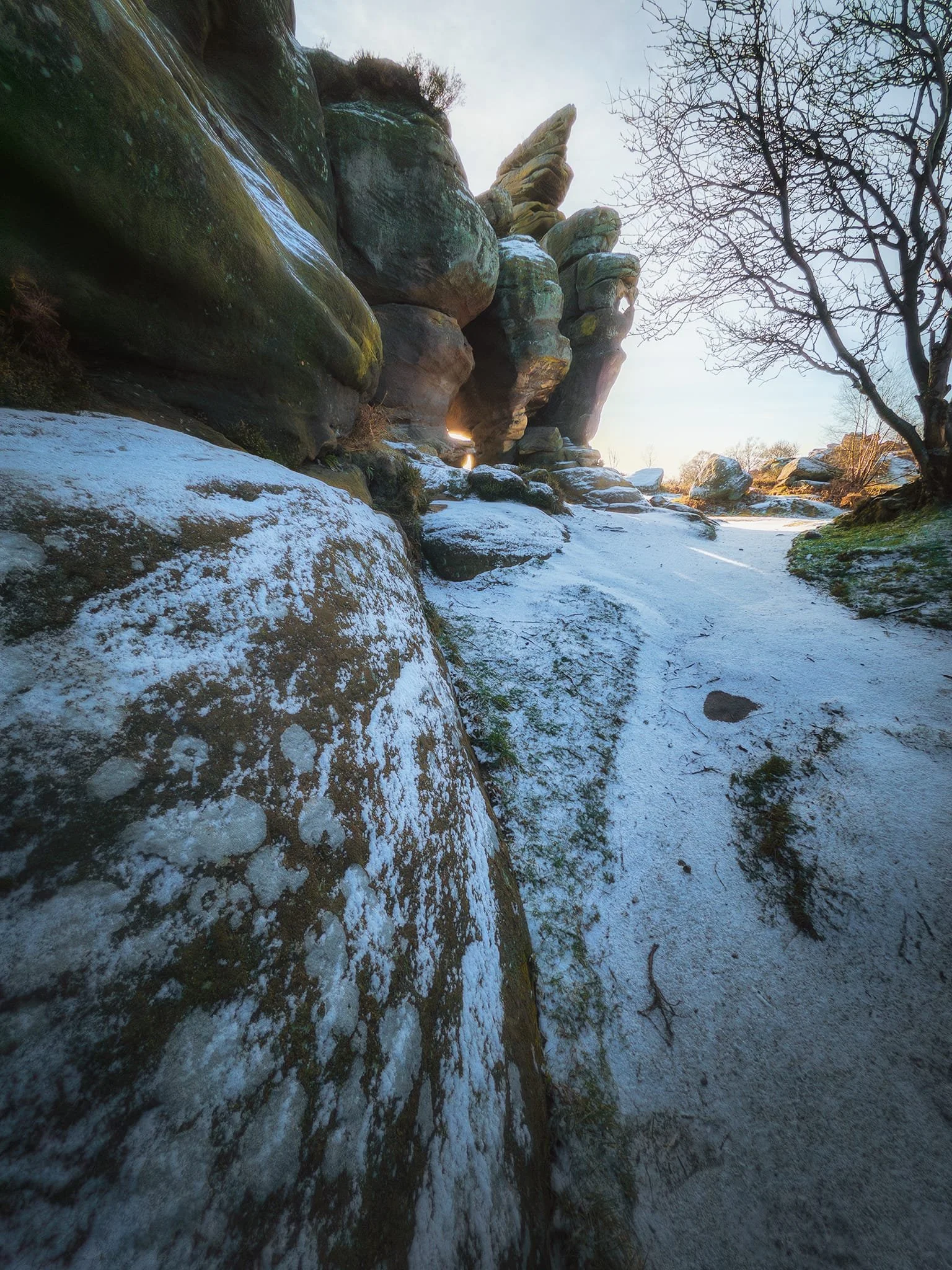 I clambered down below the Eagle to get myself into deep shadow, using the ice and snow on the rocks as leading lines towards the remarkable Eagle formation.