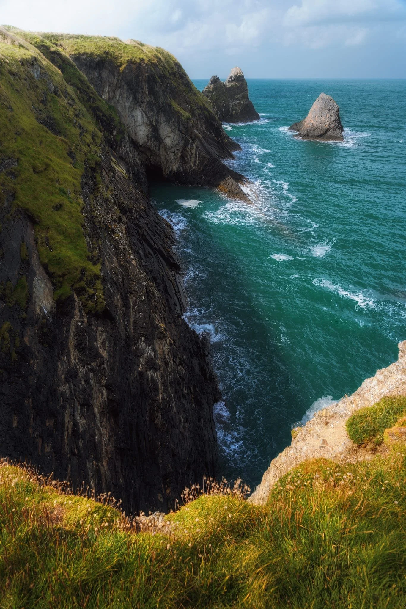 A sheer drop down to the sea at my feet, as near as I dared it, but for this vertiginous composition of Careg Wylan .