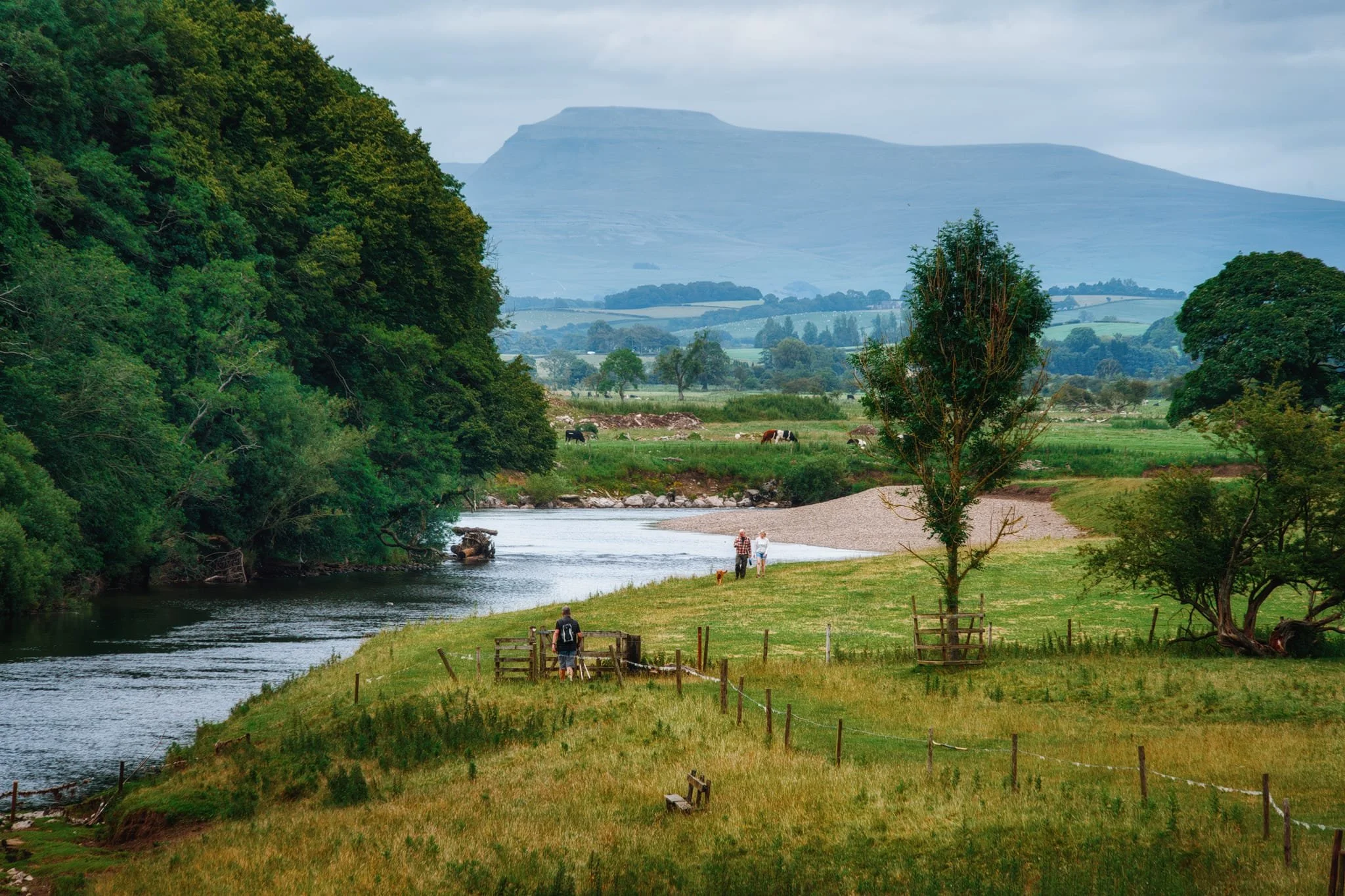 Now on the riverside footpath, a view zoomed in from atop the waterworks bridge—which carries the Thirlmere Aqueduct—shows the distinctive profile of Ingleborough in the Yorkshire Dales.