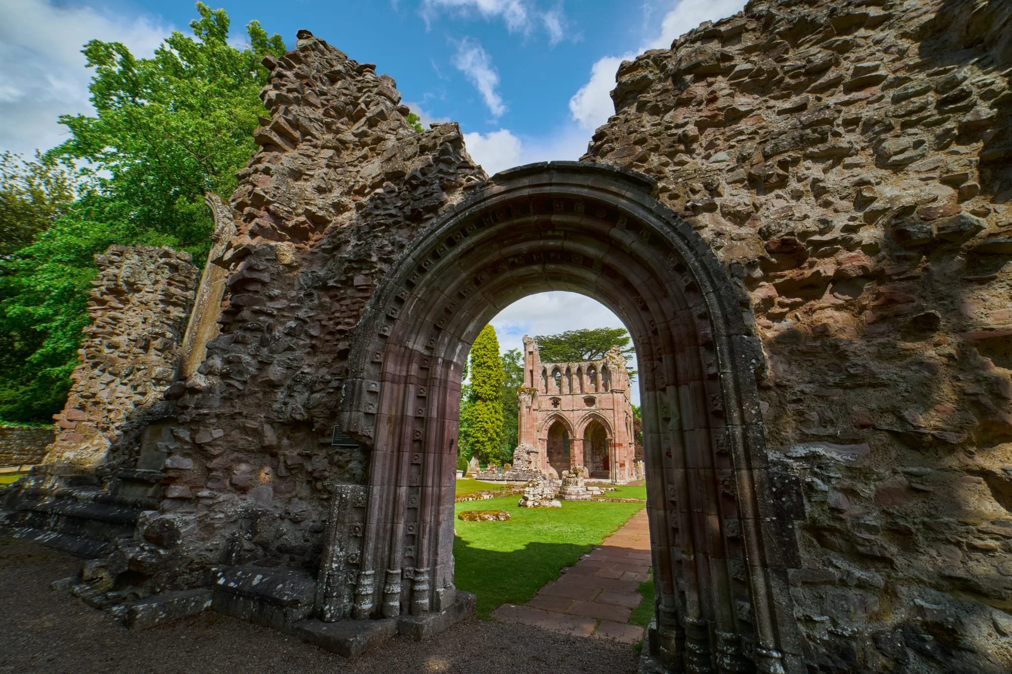 The way to the Cloister Garth, the heart of monastic life. I enjoyed the details and intricacies of the doorways around the ruins, and used this one to frame a composition of the North Transept.