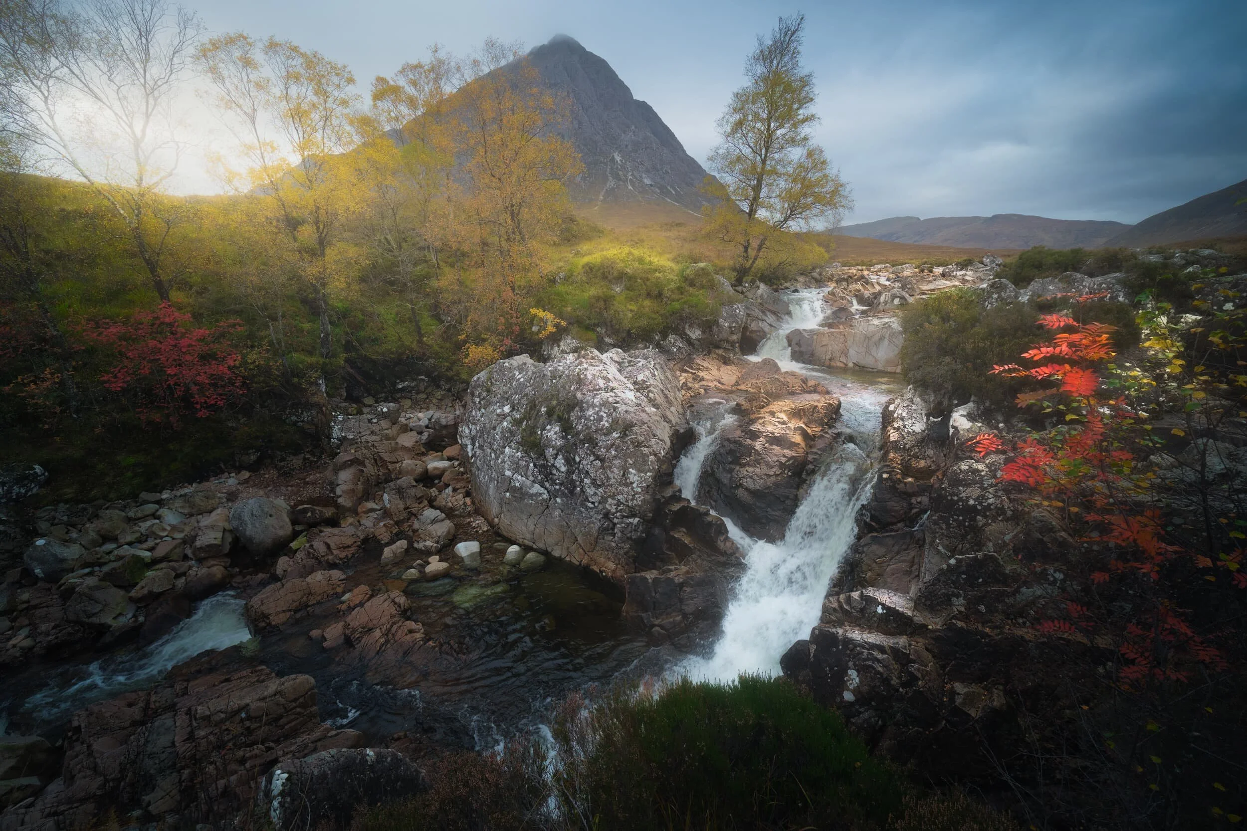 Heading back out of Glencoe and towards Glen Etive, where the River Coupall joins the River Etive, there are a series of wonderful falls and cascades surrounded by seriously vibrant autumnal foliage. One can nab some particularly delicious compositions involving the Buachaille here.