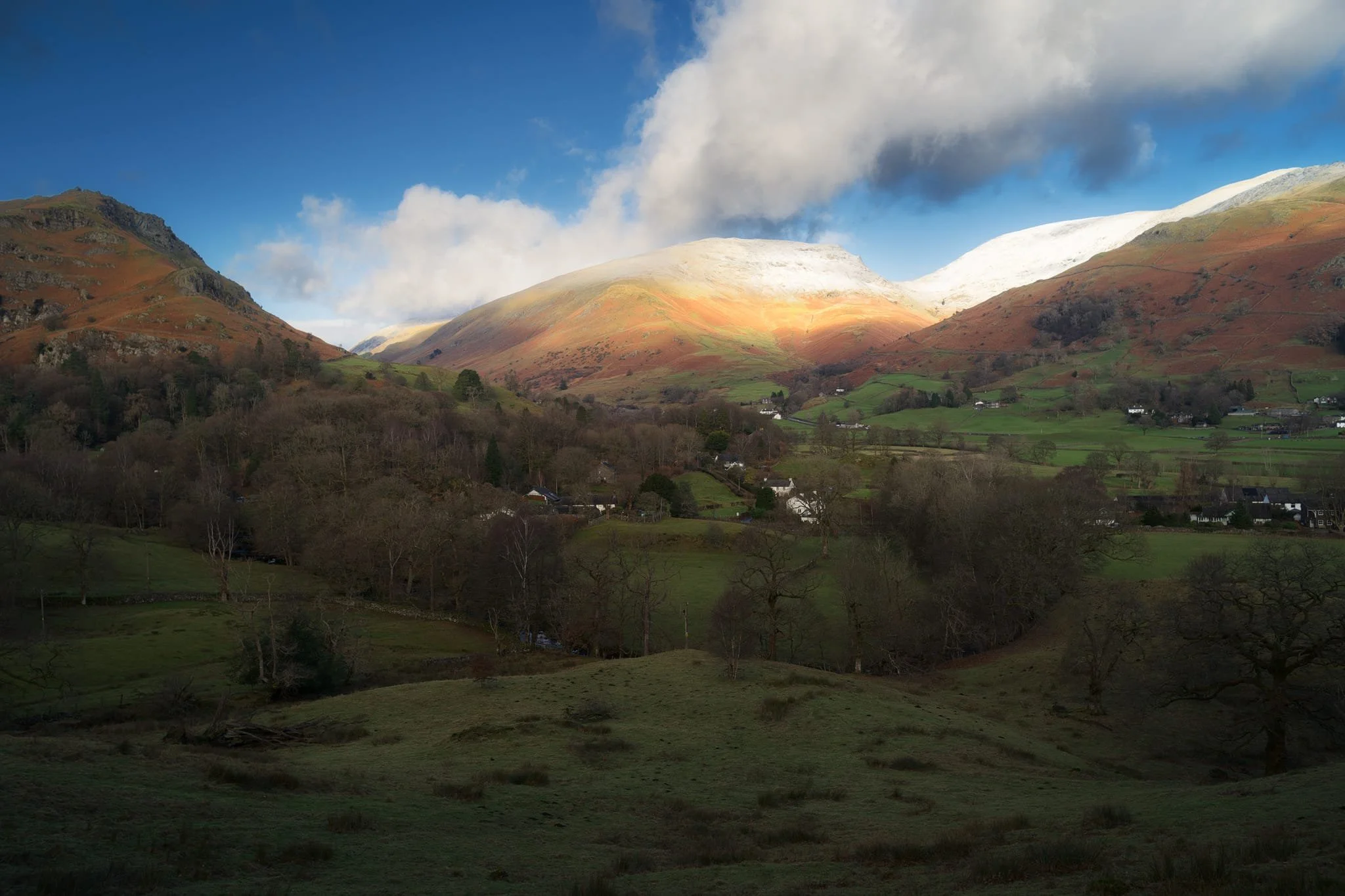 Expansive views from the Allan Bank trail lead to Seat Sandal being bathed in afternoon winter sun.