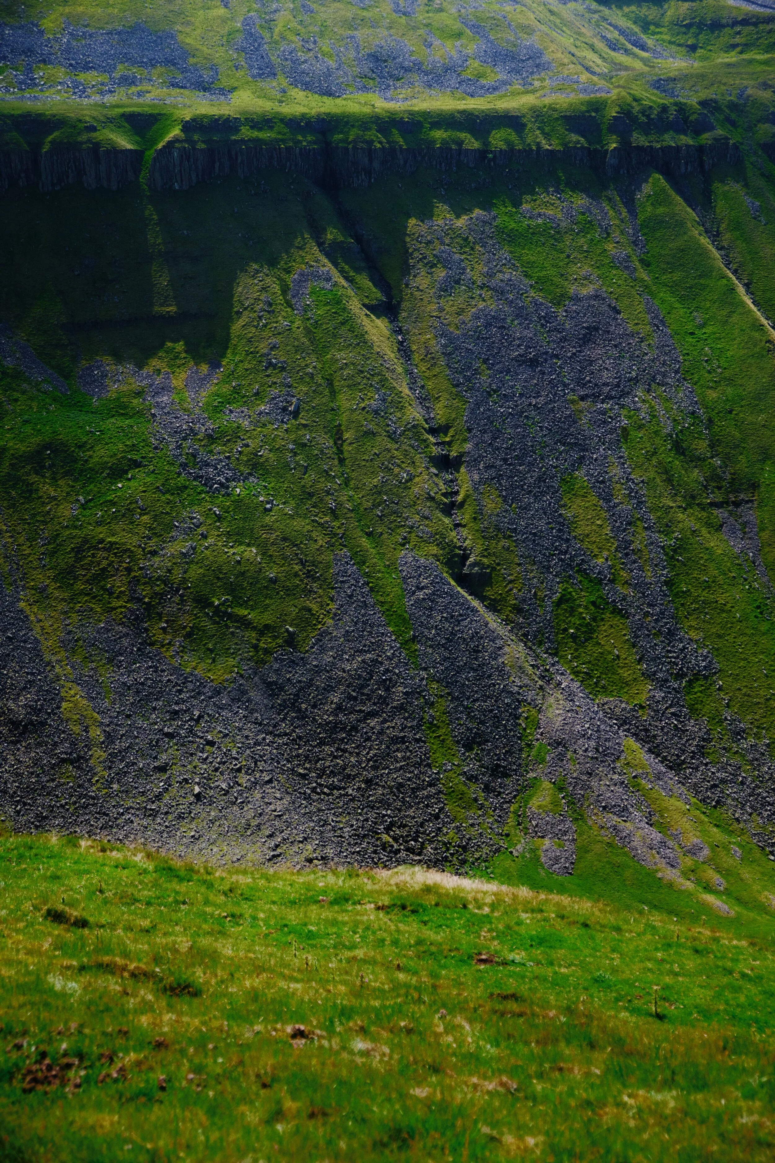 Looking down the sheer drop to the floor and back up the other side.