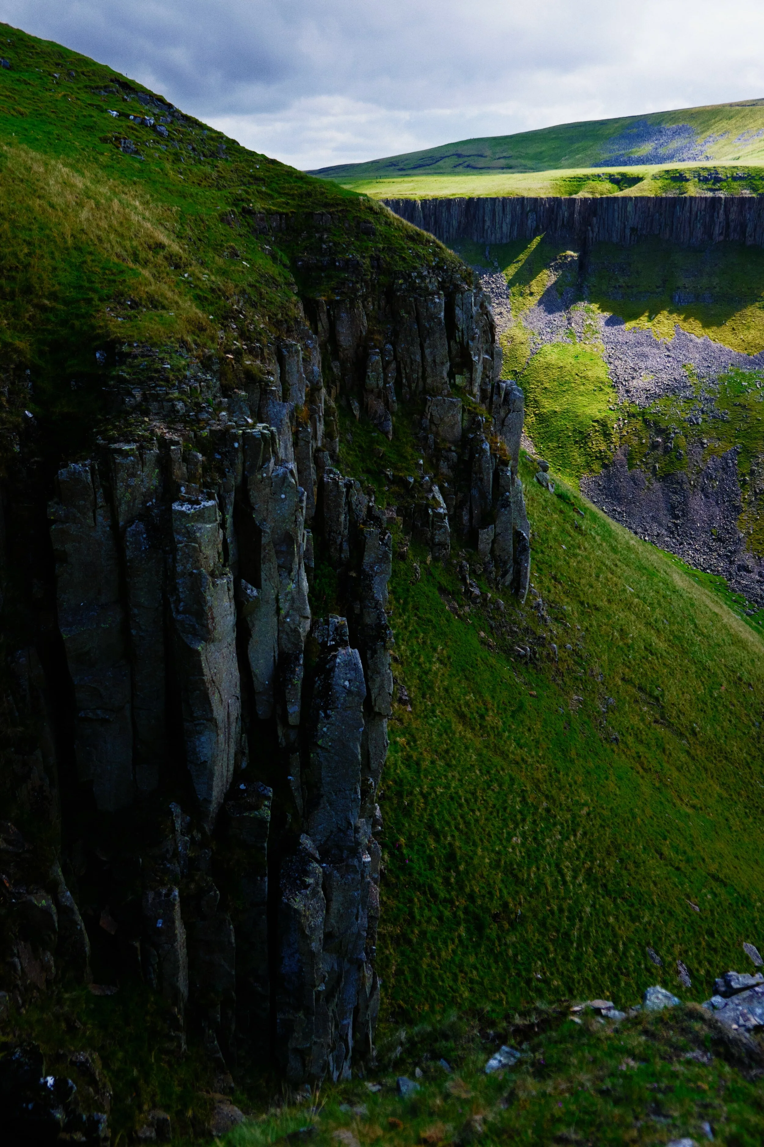 Zooming in on the details of these cliffs, whilst the other side of valley gets blasted with light.