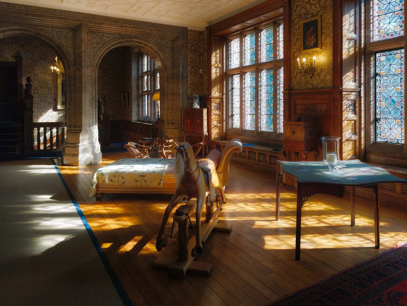 The Gallery, with beautiful light streaming through the stained glass windows.