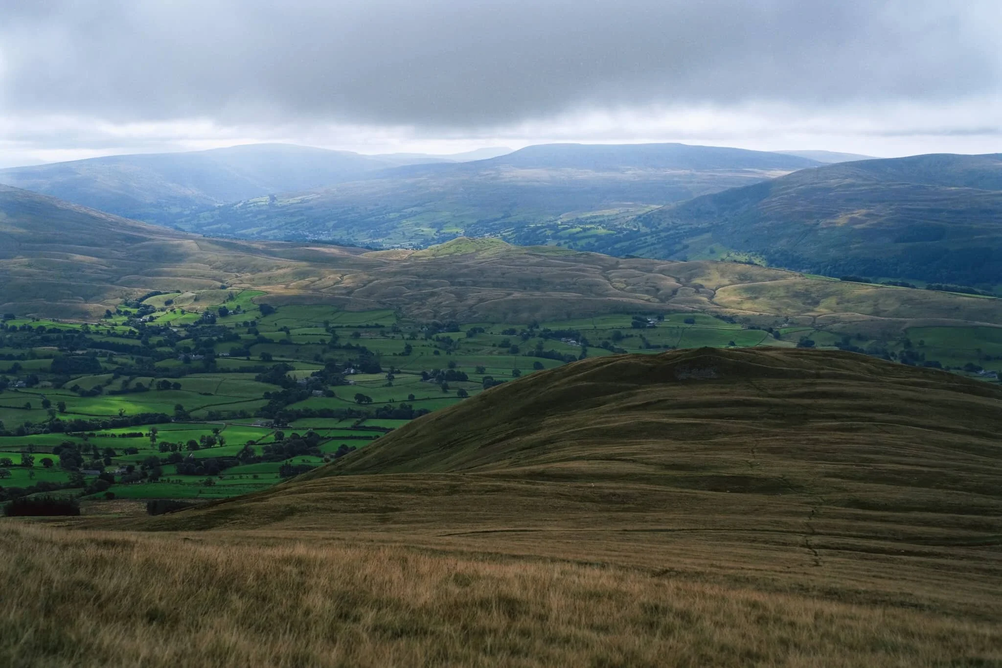 The little knobbly fell to the right is our next destination: Crook. There’s not any “official” path to the fell, but that’s no major bother anyway. The Howgills is all Open Access Land.