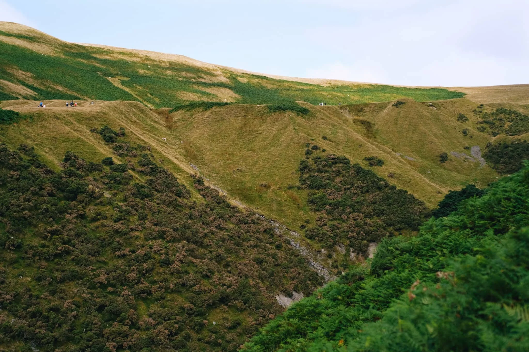 Settlebeck Gill is an impressive sight. The little people hiking the Dales High Way give an indication of scale.