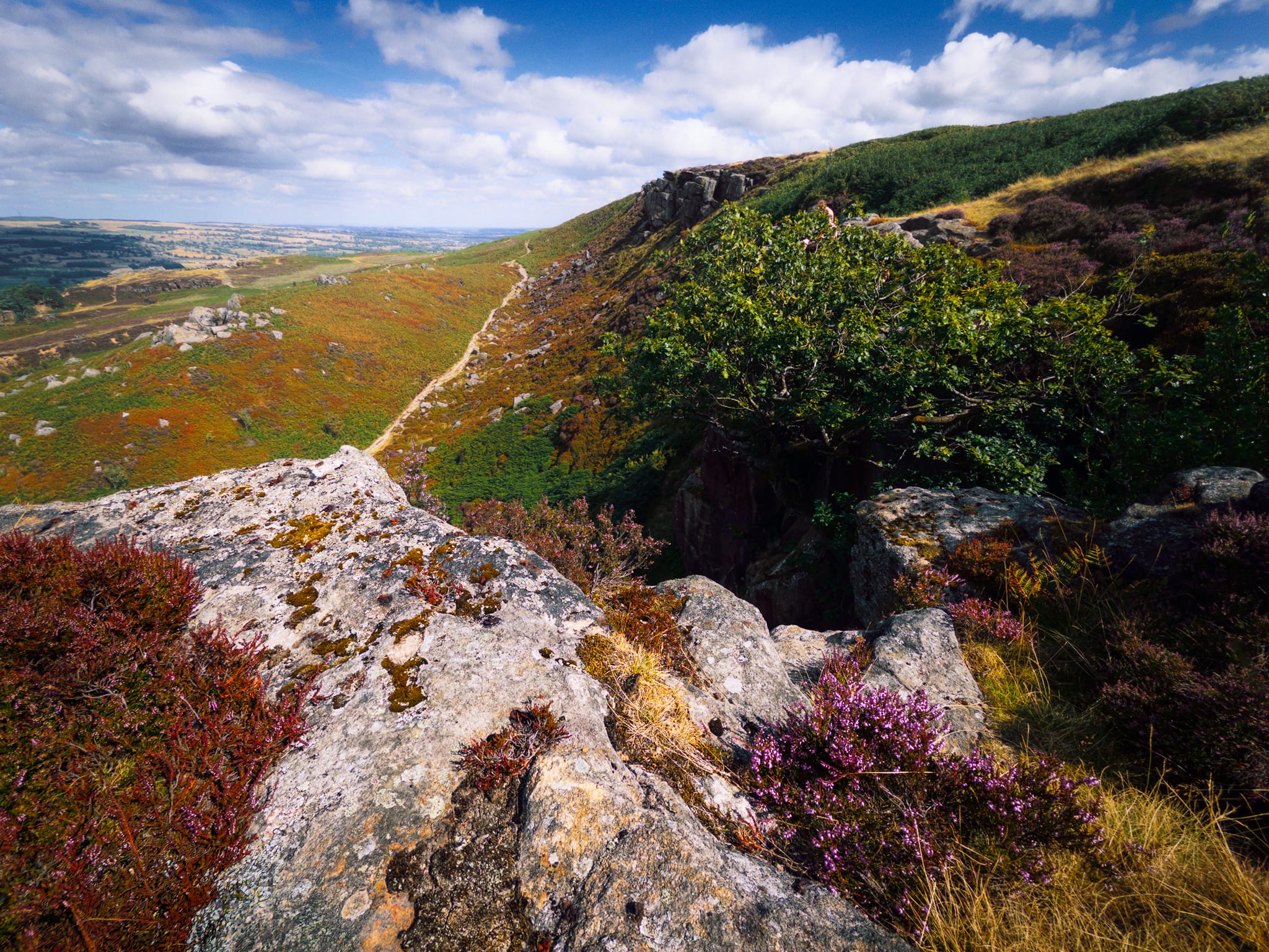 Looking eastwards from Ilkley Crags. Below is Rocky Valley which carries the Dales Way.