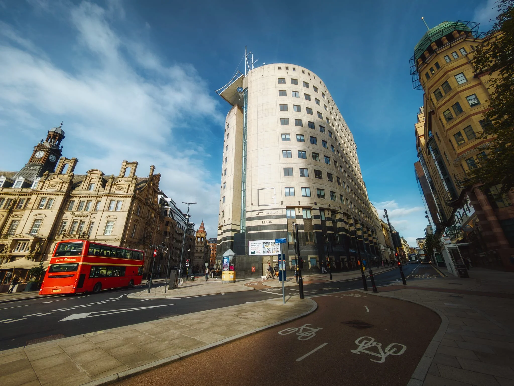 Leeds City Square. The building on the left is the former Leeds General Post Office, opened in 1896. The fancy one in the middle is 1 City Square, completed in 1998, and houses a range of professional and legal firms with modern office spaces.