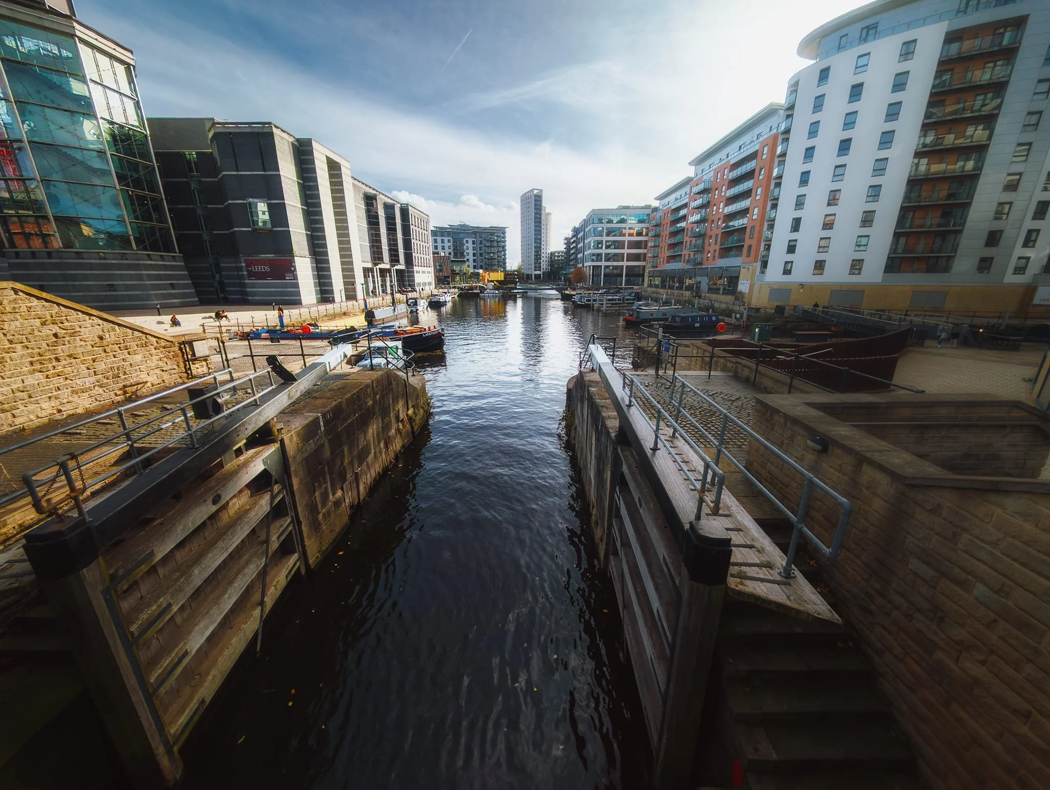 An ultra-wide perspective from Leeds Dock, with the Royal Armouries Museum on the left.