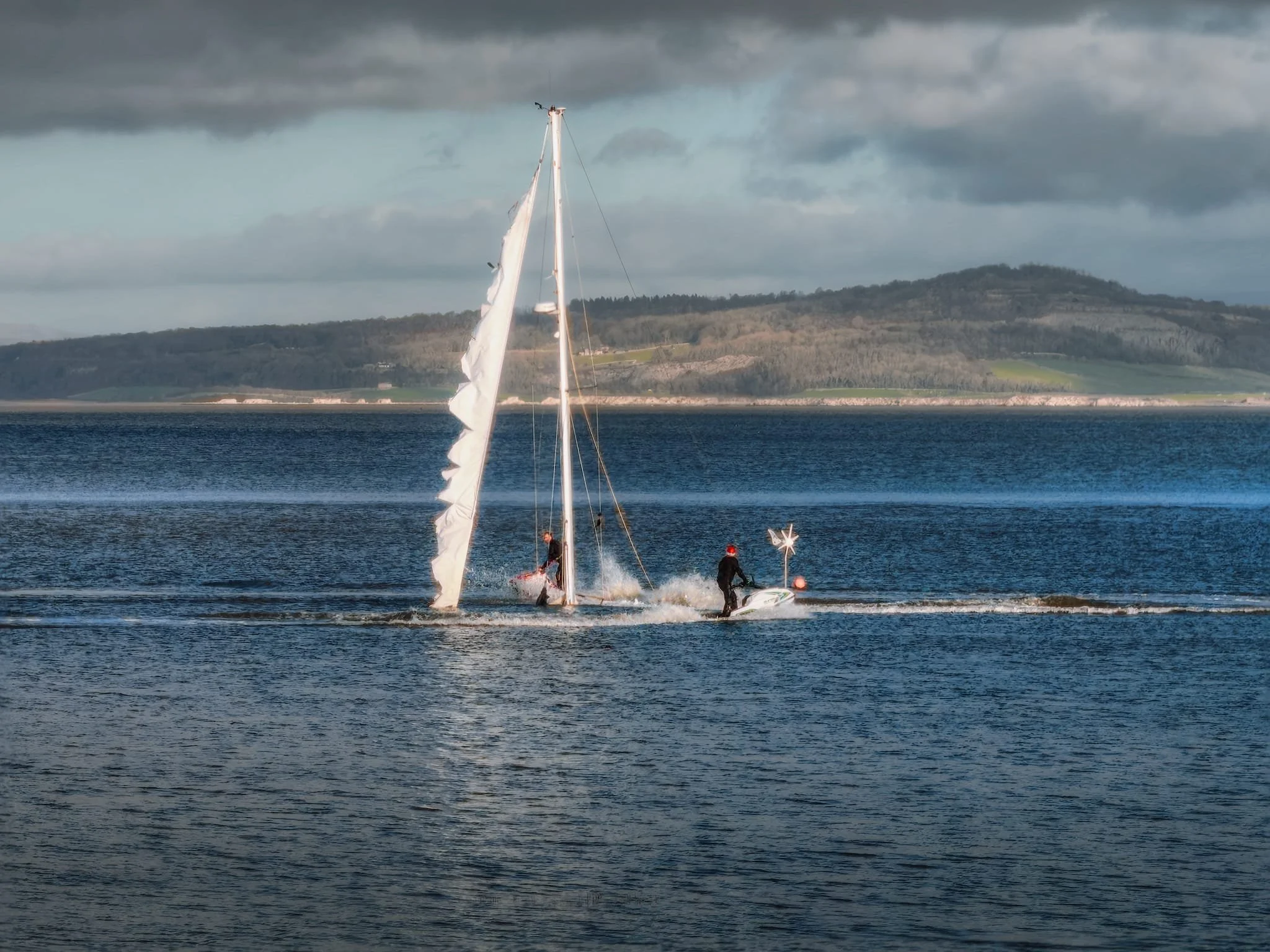 By the time we’d arrived at Morecambe, high tide had just passed so there was still plenty of water in the bay. I spotted two people, one of whom was wearing a santa hat, on jet skis circulating around an abandoned and sunken boat. Never change, Morecambe.
