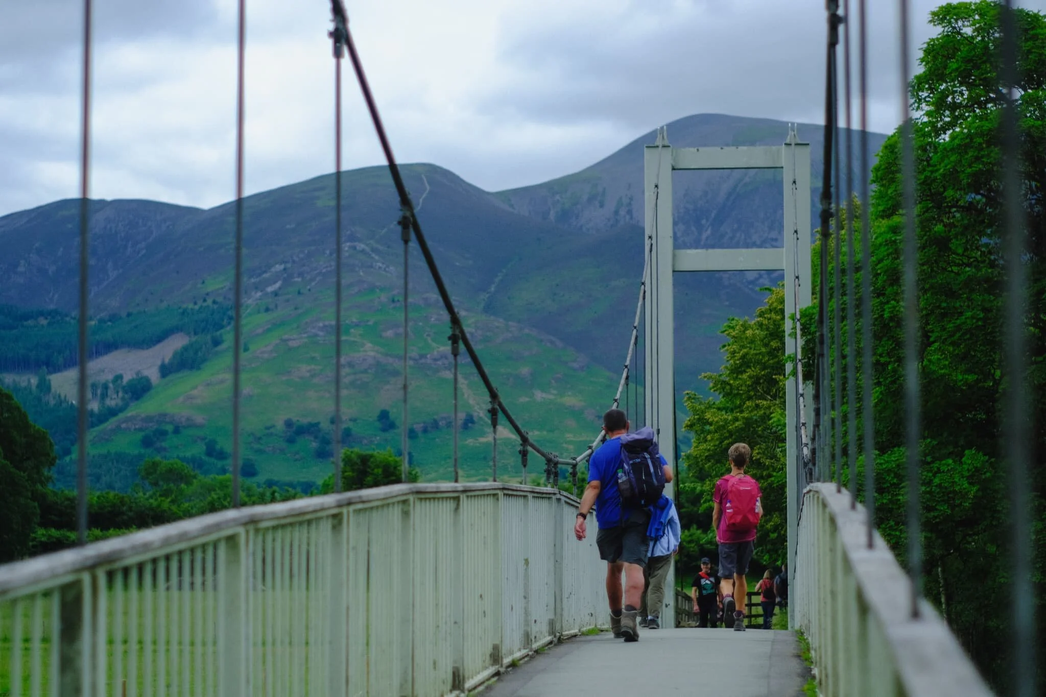 Stormwater Bridge, a suspended footbridge, indicates our approach is near Keswick. The Skiddaw range looms ever closer.