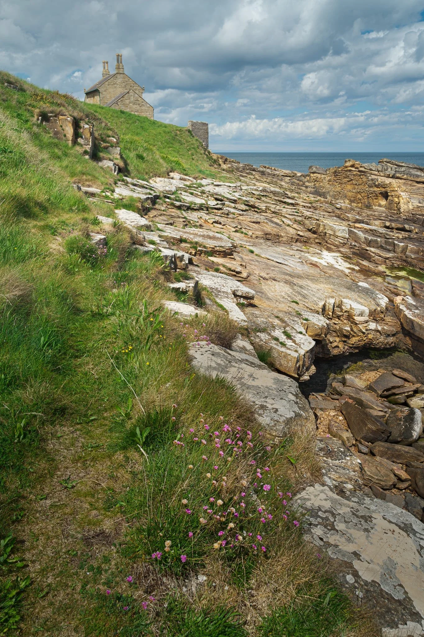 Looking north from above the beach is the old Bathing House, built by Charles 2nd Earl Grey for his children to sea bathe from. It’s also been known as Jenny Patterson’s Cottage , Miss Henderson’s Cottage and Christie’s House . Nowadays it serves as in-demand holiday accommodation.