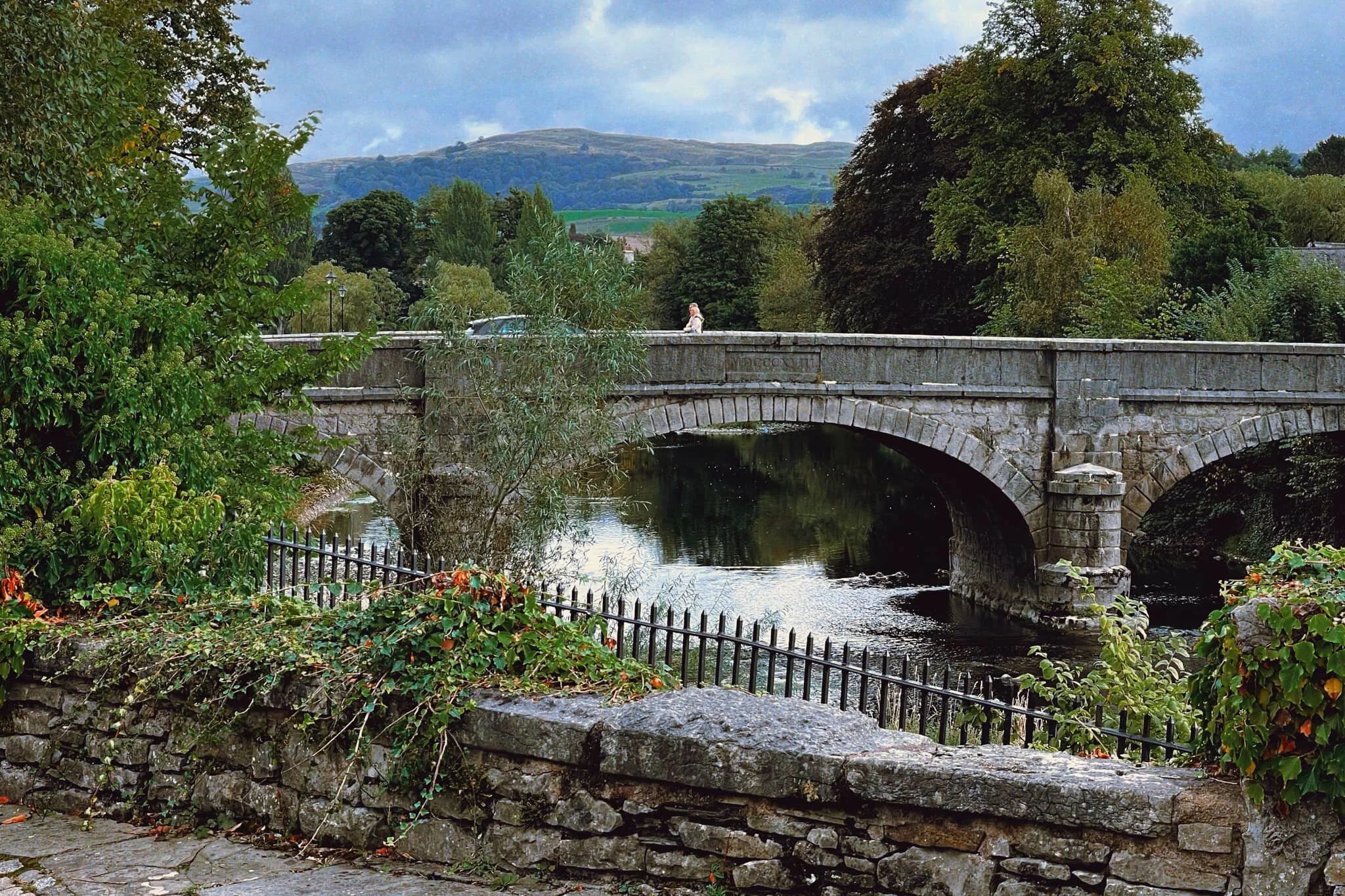 Beautiful Miller Bridge with Benson Knott rising above in the distance.