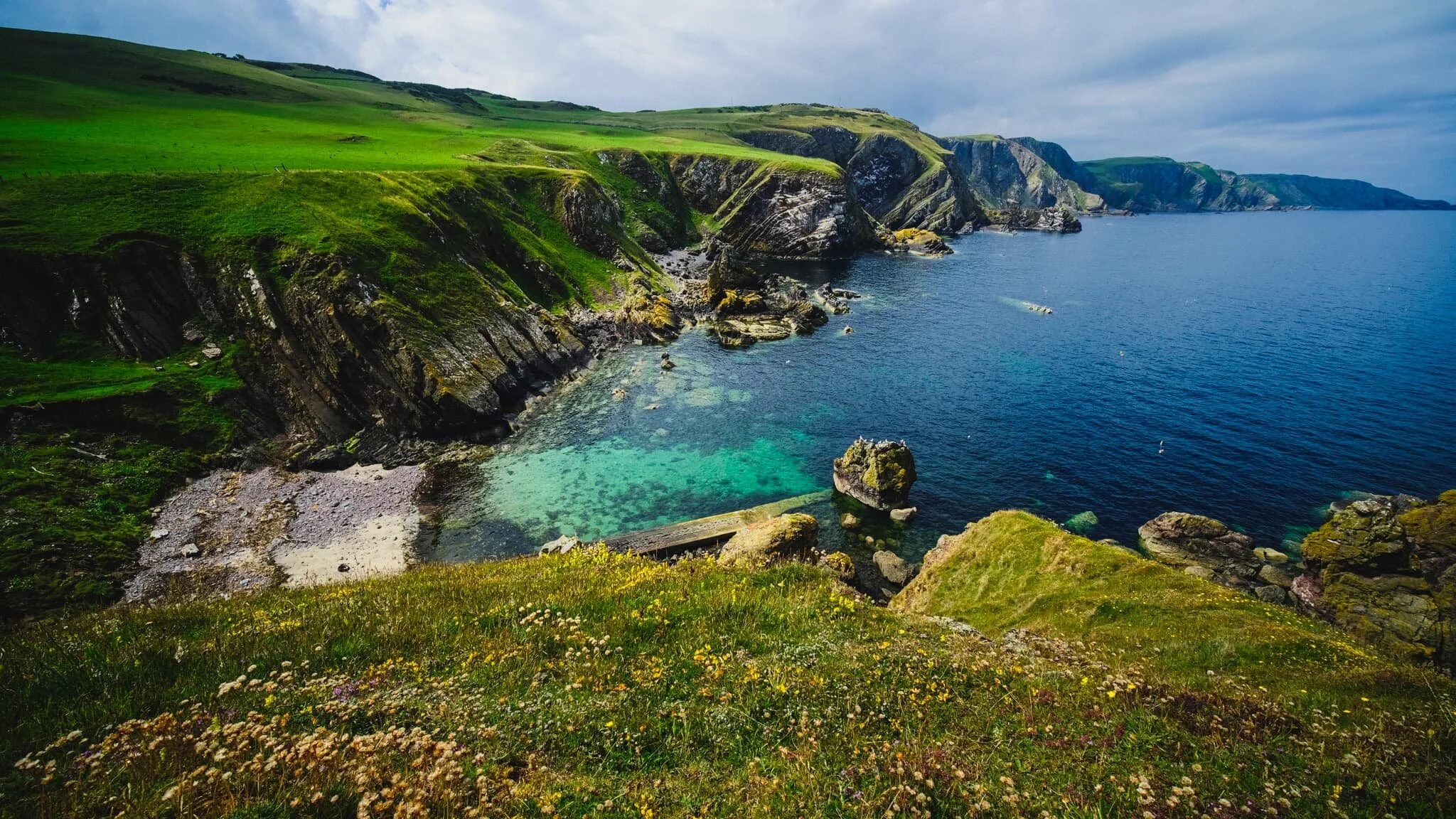 And there it is. Pettico Wick Bay and the twisted cliffs of Uilystrand Brae on a perfect summer’s day.