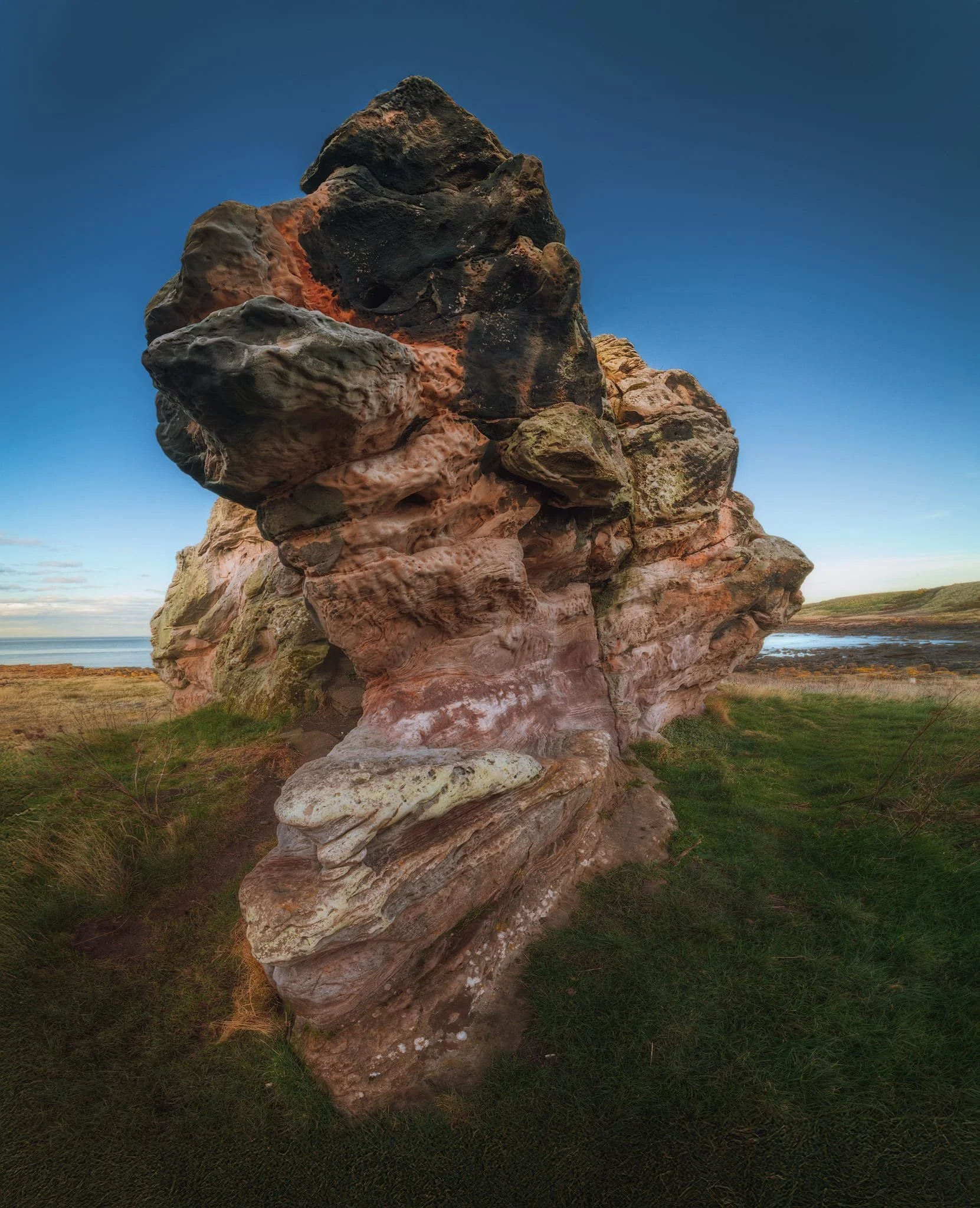Similarly, this unique view of Buddo Rock is made up of eight landscape photos stacked top to bottom to present a massive ultra-wide view of this incredible natural sculpture.