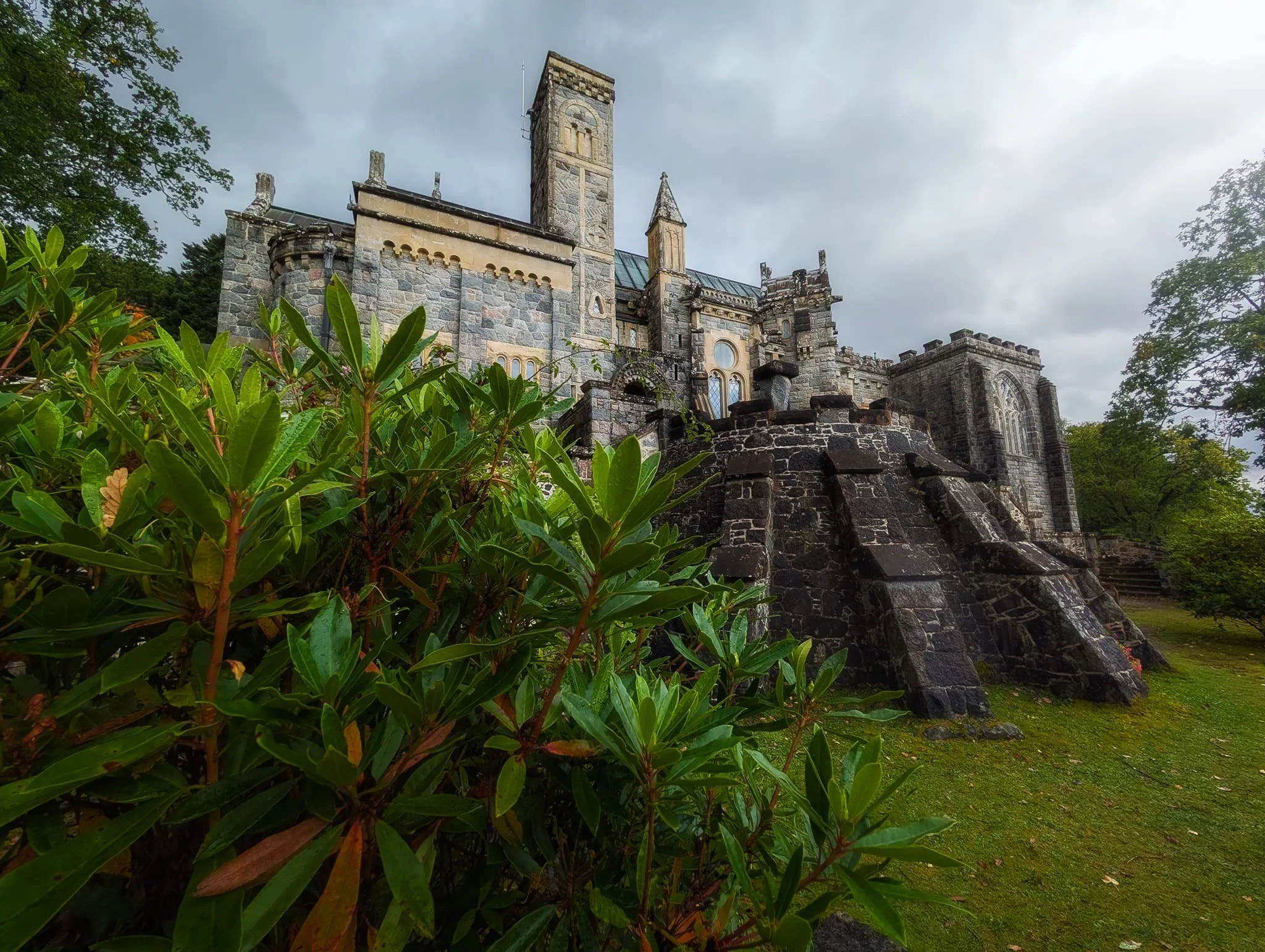 A blast of light escapes from the racing clouds, illuminating the kirk.
