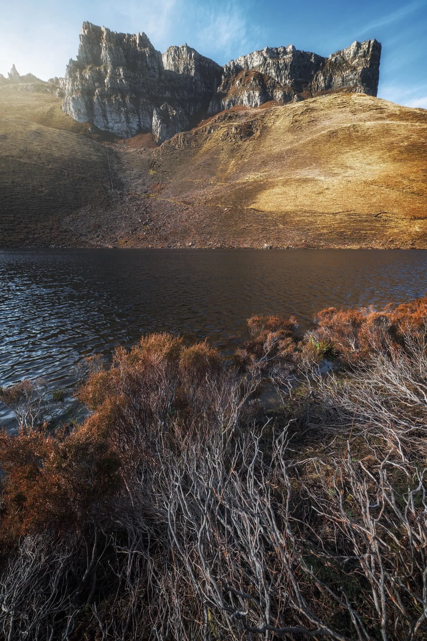 Beyond Loch Langaig, the trail starts to quickly ramp up and you soon arrive directly beneath the impressive Fingal’s pinnacles. Below the pinnacles is Loch Hasco, which I cautiously clambered down to for this breathtaking composition.