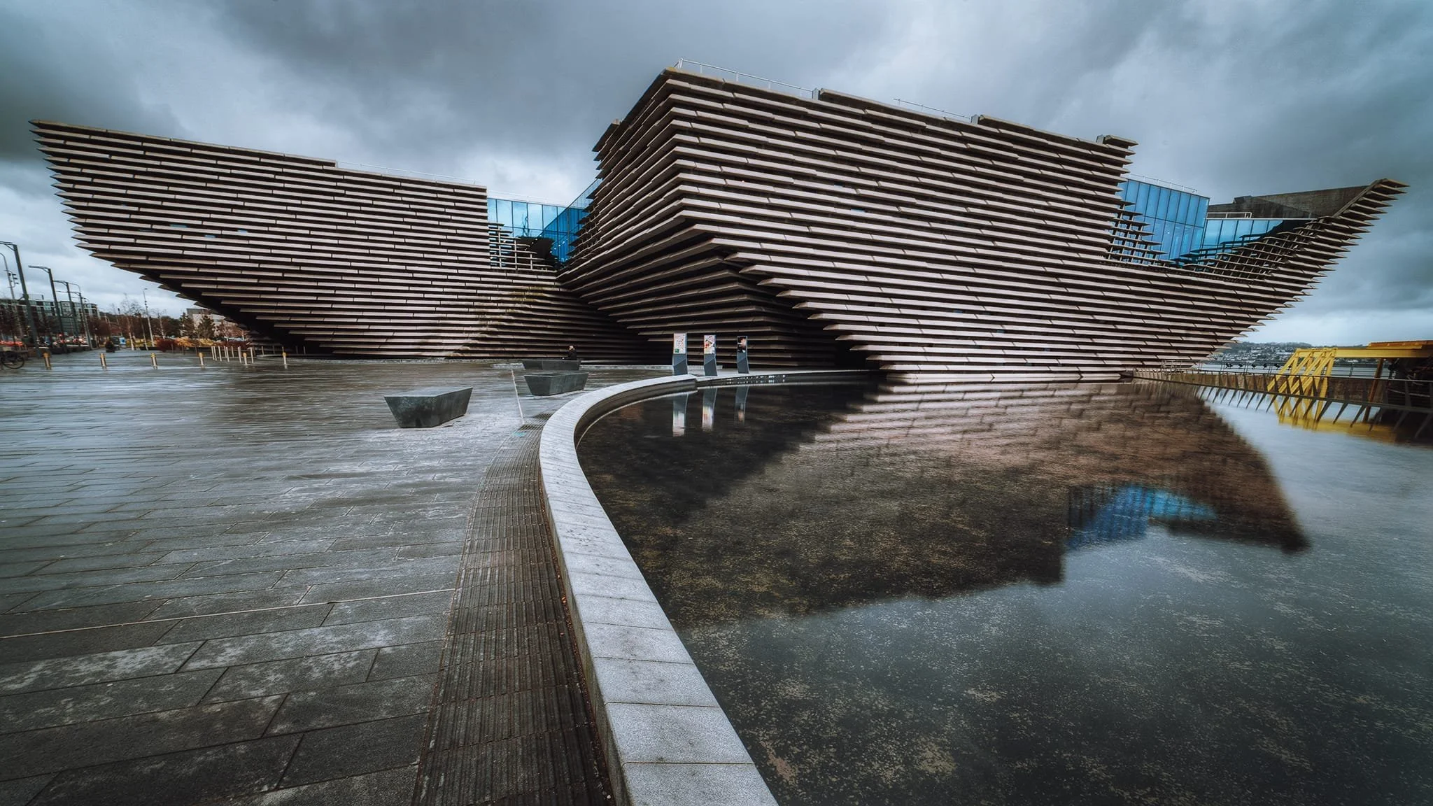 The striking design of the V&A Dundee. It uses multiple horizontal layers of precast concrete to create shadows and changes, reflecting the cliffs of Scotland.