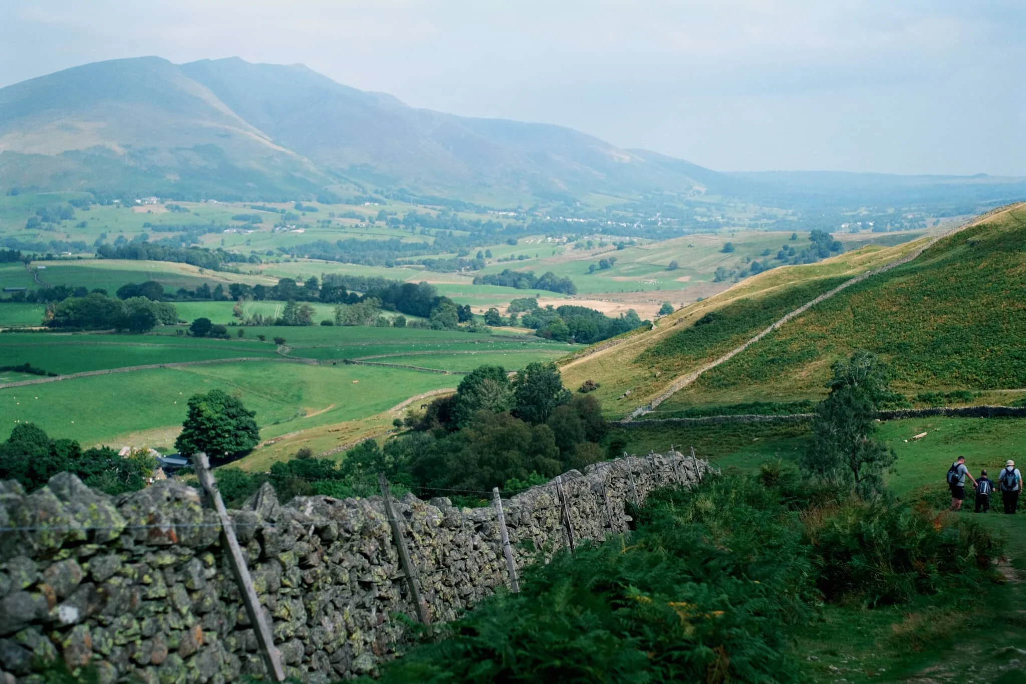 Plenty of other fell walkers were making their way up and down the trail. To the left in the distance is the magnificent slopes and peaks of Blencathra.